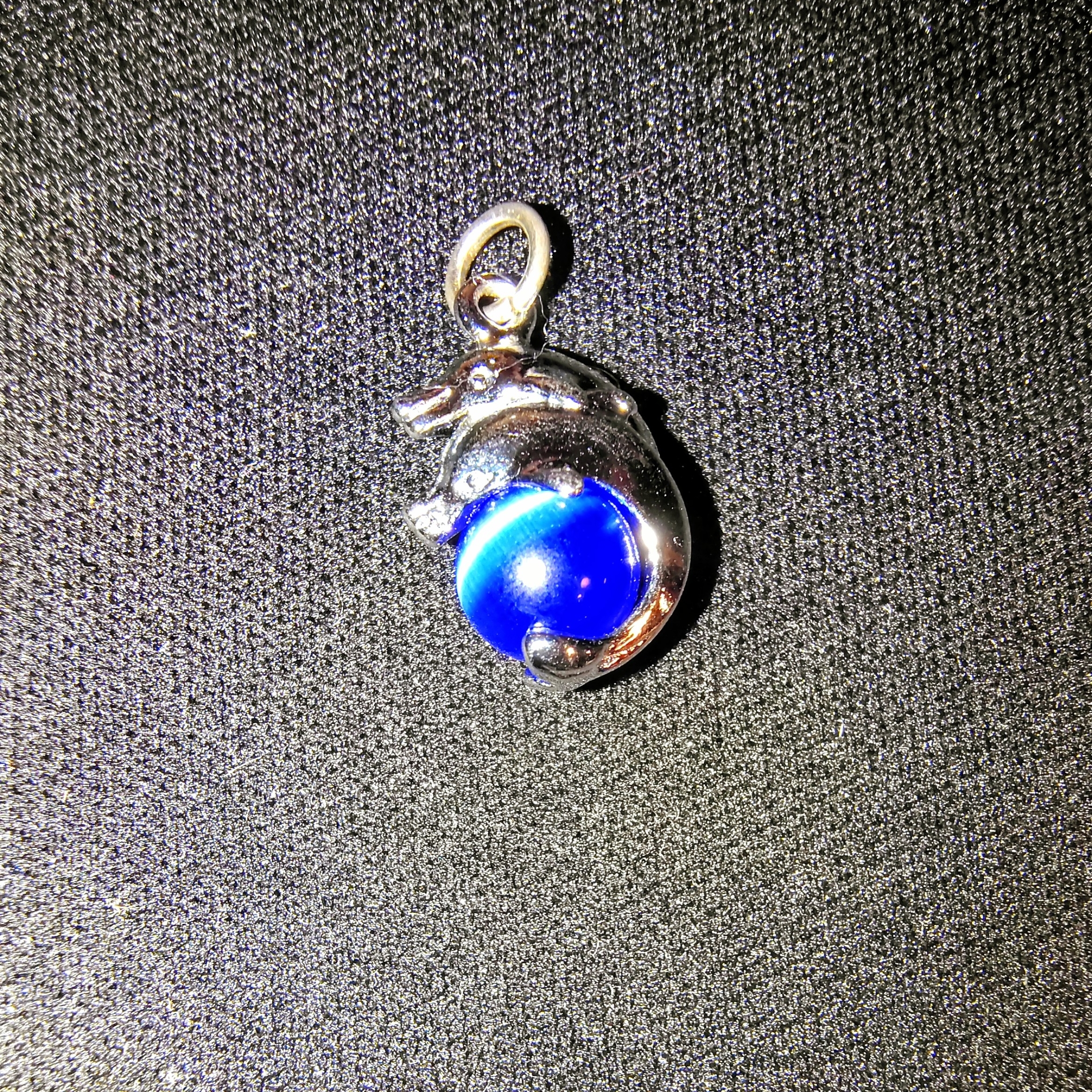 Silver Dolphin Pendant With Blue Orb 15$